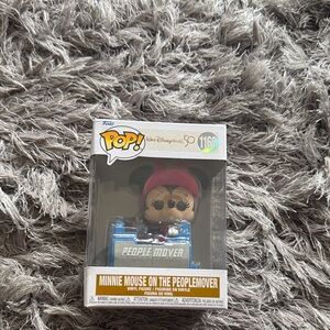 Funko Pop Minnie Mouse on People Mover